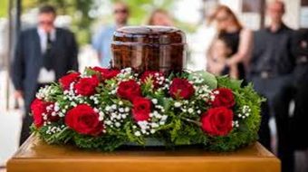 red flowers at funeral